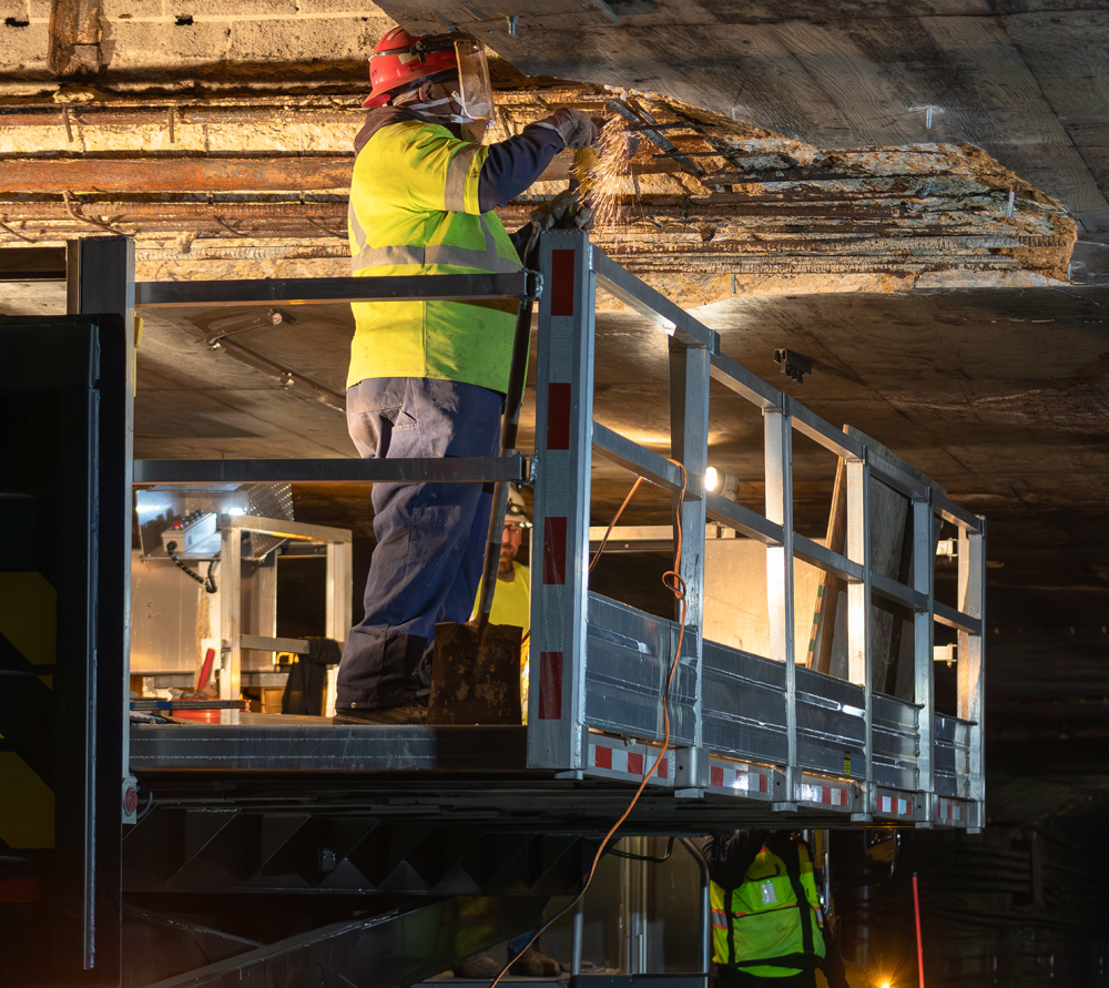 Restored the deteriorated concrete ceiling above the tracks.