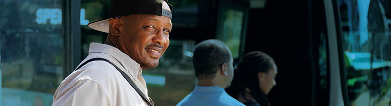 Metro Lift Man in Hat