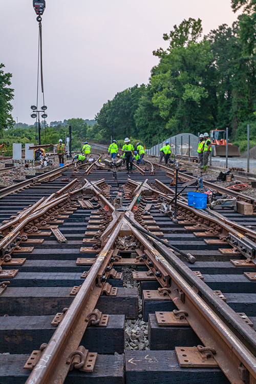 Crews check new wields that give customers a smoother ride.