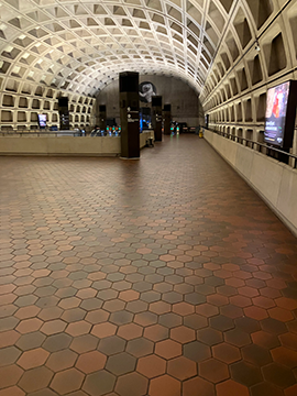 A picture of the pathway from the Greenbelt side of the Upper Platform to the faregates that precede the exit on D St and 7th St.