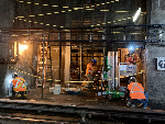 To maximize work production and safety, Metro used a new plan separating the work zone in the tunnel. Here, workers are installing a rope and mesh barrier system. The barrier system allows work to continue 24/7 avoiding disruption to train service.
