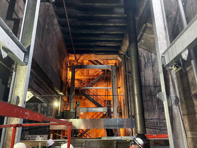 New steel vertical columns and beams that will support the second floor over the tracks.